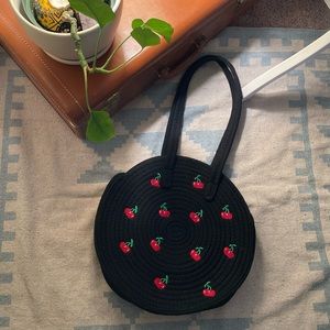Black round woven bag with embroidered cherries 🍒